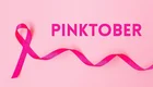 Eine pinke Schleife liegt auf einem pinken Hintergrund. Darüber steht in großen, auffälligen Buchstaben das Wort "PINKTOBER".