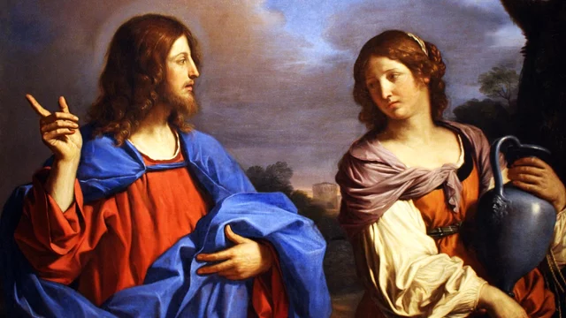 Jesus sitzt neben Maria Magdalena und unterhält sich mit ihr..